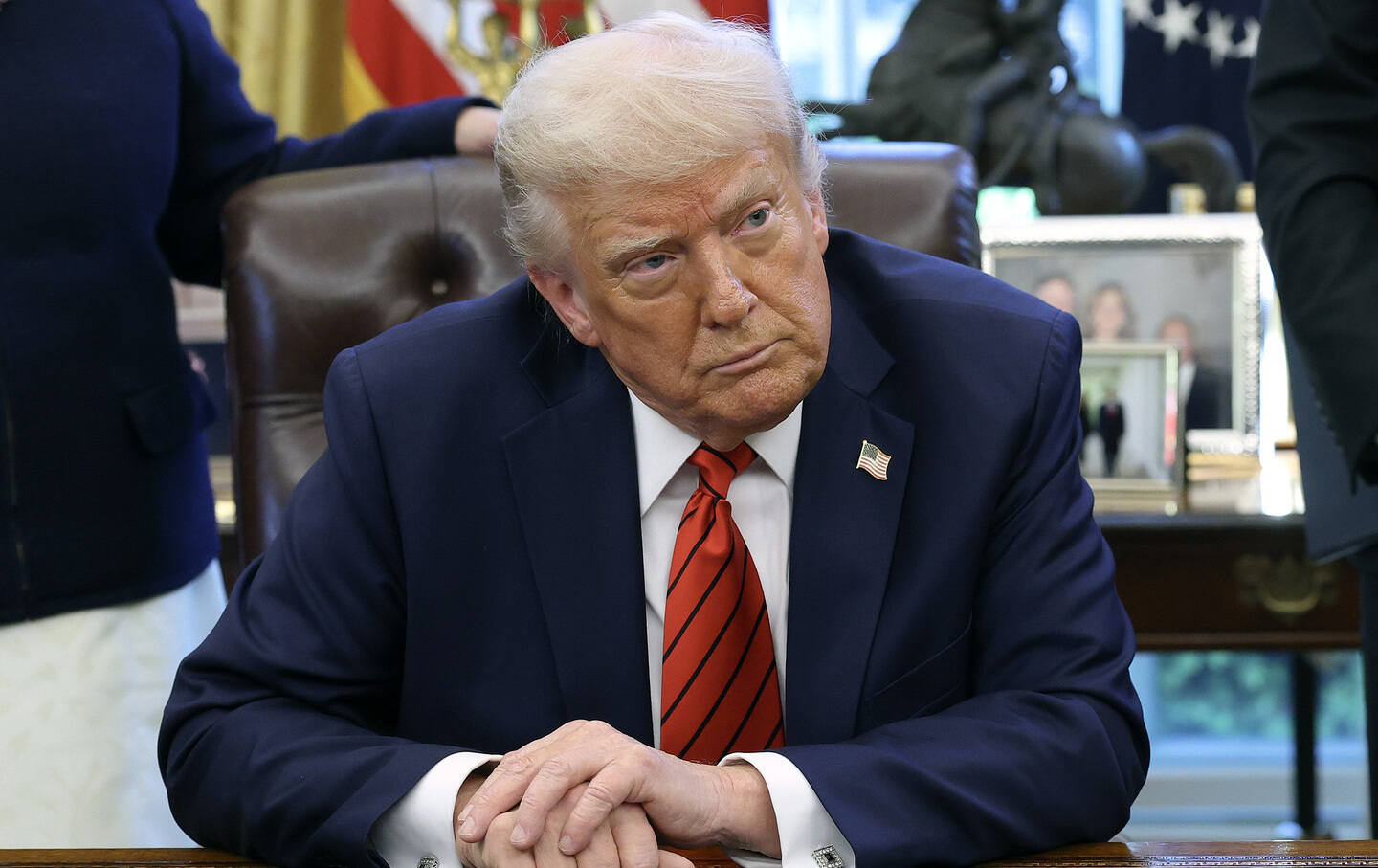President Donald Trump speaks to reporters after signing a proclamation in the Oval Office at the White House on April 17, 2025, in Washington, DC.